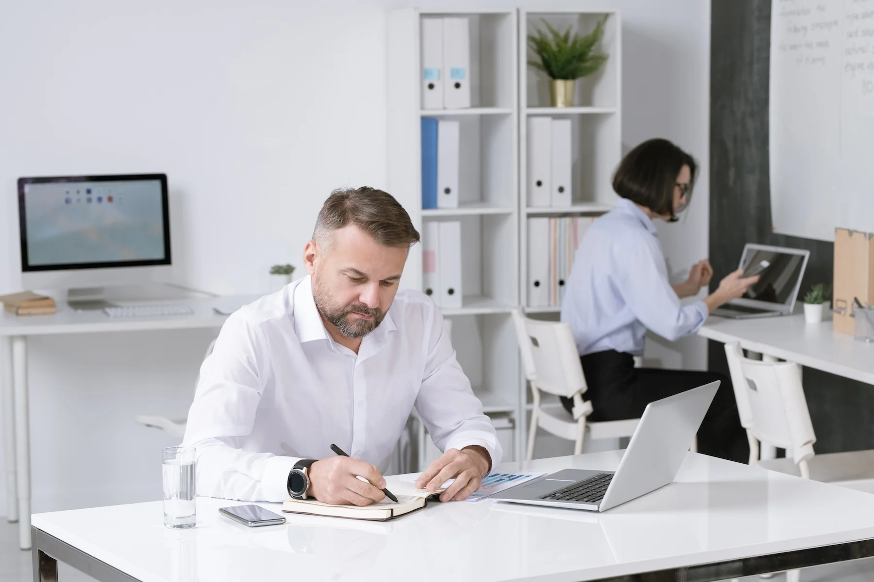 serious-bearded-employer-thinking-of-new-ideas-and-2025-03-16-09-19-22-utc